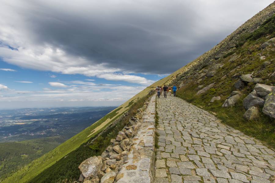 Cobblestone mountain path leading up the side of Sněžka, the highest peak in the Czech Republic.