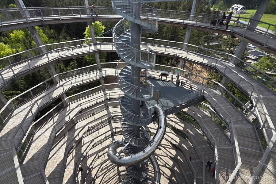 Spiral walkway and observation tower above the forest canopy at the Treetop Walk in Janská Lázně.